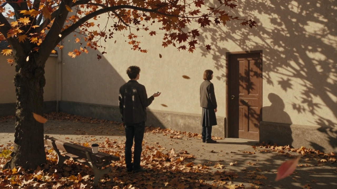 Двое стоят под вишнёвым деревом, листья падают, ключ в руке, кофейная чашка на скамейке.